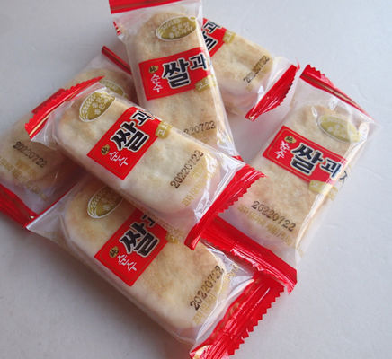 comprar Galletas japonesas elípticas del sésamo de Senbei de las galletas saladas dulces del arroz online manufacture