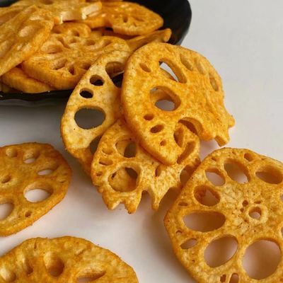 Buen precio El sabor de los cangrejos secó las legumbres de frutas Lotus Root Snacks picante en línea